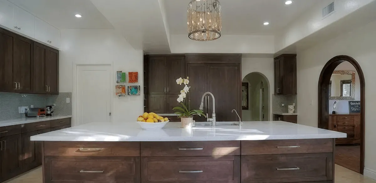 Cabinet refacing project with updated kitchen cabinets and island in Bradenton, FL